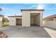 Garage doors are open to reveal an empty garage at 1725 Bannie Ave, Las Vegas, NV 89102