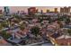 Aerial view of houses and city skyline in background at 2205 Alia Ct, Las Vegas, NV 89102