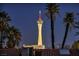 Night view of the property with city skyline in background at 2205 Alia Ct, Las Vegas, NV 89102