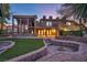 Backyard view at dusk showing the home's modern design at 2205 Alia Ct, Las Vegas, NV 89102