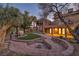 Landscaped backyard with firepit and covered patio at 2205 Alia Ct, Las Vegas, NV 89102