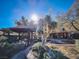 Landscaped backyard with gazebo and mature trees at 2205 Alia Ct, Las Vegas, NV 89102