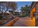 Backyard view at dusk showing a gazebo and landscaping at 2205 Alia Ct, Las Vegas, NV 89102