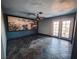 Spacious bedroom with dark slate floors, a ceiling mural, and patio access at 2205 Alia Ct, Las Vegas, NV 89102