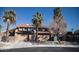 Two-story home with a double garage and desert landscaping at 2205 Alia Ct, Las Vegas, NV 89102