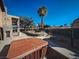 Relaxing hot tub with covered patio and desert landscaping at 2205 Alia Ct, Las Vegas, NV 89102