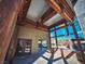 Covered patio with ornate wooden beams and double doors at 2205 Alia Ct, Las Vegas, NV 89102