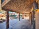 Covered patio with stone pillars and access to backyard at 2205 Alia Ct, Las Vegas, NV 89102