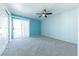 Spacious bedroom with light blue walls and carpet flooring at 3550 Bay Sands Dr # 3061, Laughlin, NV 89029