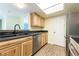 Modern kitchen with stainless steel appliances and light wood cabinets at 3550 Bay Sands Dr # 3061, Laughlin, NV 89029