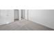 This bedroom boasts neutral walls, carpet, and a closet that offers storage space at 633 N Water St, Henderson, NV 89015