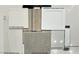 Selection of interior finishes, including quartz countertops, flooring, cabinets, and tile samples at 633 N Water St, Henderson, NV 89015