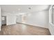 Bright living area with wood-look flooring, ample natural light, and neutral wall colors at 633 N Water St, Henderson, NV 89015