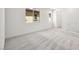 Bright upstairs hallway area with neutral carpet and lots of natural light at 633 N Water St, Henderson, NV 89015