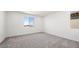 Spacious bedroom with large windows offering a view of the surroundings at 647 N Water St, Henderson, NV 89015