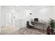 Upstairs loft area with a built-in desk, neutral carpet, and great natural light at 647 N Water St, Henderson, NV 89015