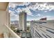 Stunning aerial view of a high-rise condo building with tennis courts and beautiful landscaping, providing a resort-like atmosphere at 2747 Paradise Rd # 2206, Las Vegas, NV 89109