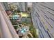 Overhead view of a condominium including tennis courts, pool, and lush landscaping at 2747 Paradise Rd # 2206, Las Vegas, NV 89109