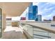 Expansive balcony with sleek glass railing and partial city views from luxury condo at 2747 Paradise Rd # 2206, Las Vegas, NV 89109