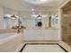 This spacious bathroom features a soaking tub, double vanity, and modern fixtures at 2747 Paradise Rd # 2206, Las Vegas, NV 89109
