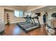 Bright gym featuring wood floors and modern cardio equipment, providing a state-of-the-art fitness experience at 2747 Paradise Rd # 2206, Las Vegas, NV 89109