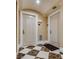 Hallway with marble tile floors and neutral paint at 2747 Paradise Rd # 2206, Las Vegas, NV 89109