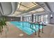 Bright indoor pool area with large windows and a unique ceiling design for comfortable swimming year-round at 2747 Paradise Rd # 2206, Las Vegas, NV 89109
