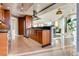 Modern kitchen featuring wood cabinets, stainless steel appliances and a large window with city views at 2747 Paradise Rd # 2206, Las Vegas, NV 89109