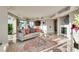 Open-concept living space with fireplace, comfortable seating, and city views at 2747 Paradise Rd # 2206, Las Vegas, NV 89109