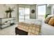 Relaxing main bedroom with a luxurious upholstered bed, stylish decor, and floor to ceiling windows at 2747 Paradise Rd # 2206, Las Vegas, NV 89109