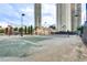 Well-kept tennis court surrounded by lush greenery and high-rise buildings, providing a vibrant and active lifestyle at 2747 Paradise Rd # 2206, Las Vegas, NV 89109