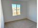 Bright bedroom featuring neutral wall and carpet at 4747 Illustria Ave, Las Vegas, NV 89141