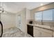 Kitchen with granite countertops and black appliances at 537 Kristin Ln, Henderson, NV 89011