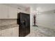Kitchen boasting black appliances and white cabinets at 537 Kristin Ln, Henderson, NV 89011