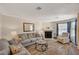 Living room with fireplace, hardwood floors, and comfortable seating at 537 Kristin Ln, Henderson, NV 89011