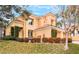 House exterior showcasing a three-car garage and manicured landscaping at 8736 Double Eagle Dr, Las Vegas, NV 89117