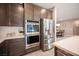 Modern kitchen with stainless steel appliances and ample counter space at 23 Cresta Villa Ct, Henderson, NV 89011