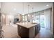 Modern kitchen island with white countertop and stainless steel appliances at 23 Cresta Villa Ct, Henderson, NV 89011