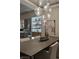 Close up of the dining room with decorative light fixture and built in shelves at 2401 Driftwood Dr, Las Vegas, NV 89107