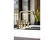 Close-up of the sink with bronze faucet and fixtures at 2401 Driftwood Dr, Las Vegas, NV 89107