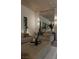 Elegant living room with a large mirror, stylish lighting, and comfortable seating creating a relaxing ambiance at 2401 Driftwood Dr, Las Vegas, NV 89107