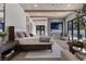 Luxurious main bedroom with ceiling beams, a fireplace, and lots of natural light at 2401 Driftwood Dr, Las Vegas, NV 89107