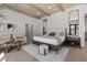 Serene bedroom with hardwood floors, neutral decor, and large windows at 2401 Driftwood Dr, Las Vegas, NV 89107