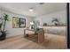 Bright office space with a large window, light hardwood floors, and modern accents at 2401 Driftwood Dr, Las Vegas, NV 89107