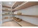Organized pantry with open shelving, recessed lighting, and plenty of storage space at 2401 Driftwood Dr, Las Vegas, NV 89107