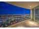 Private balcony offering stunning city views at night at 9101 Alta Dr # 1406, Las Vegas, NV 89145