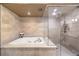 Spa-like bathroom with a large shower and soaking tub at 9101 Alta Dr # 1406, Las Vegas, NV 89145
