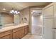Elegant bathroom with double vanity, soaking tub, and separate shower at 9101 Alta Dr # 1406, Las Vegas, NV 89145