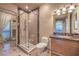 Elegant bathroom with marble vanity and large shower at 9101 Alta Dr # 1406, Las Vegas, NV 89145