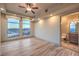 Bedroom with hardwood floors, city views, and access to bathroom at 9101 Alta Dr # 1406, Las Vegas, NV 89145